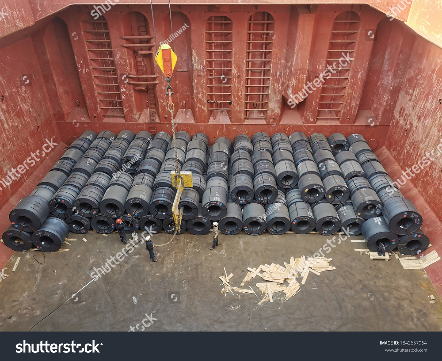 stock-photo-hot-rolled-coil-or-steel-coils-loaded-in-cargo-hold-of-a-bulk-carrier-or-cargo-ship-1842657964