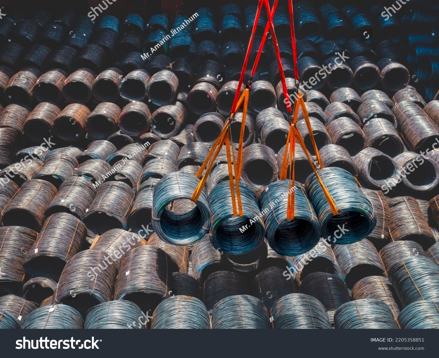stock-photo-top-view-of-wire-rods-in-coils-stowage-into-cargo-hold-of-the-vessel-discharging-steel-wire-rod-2205358851